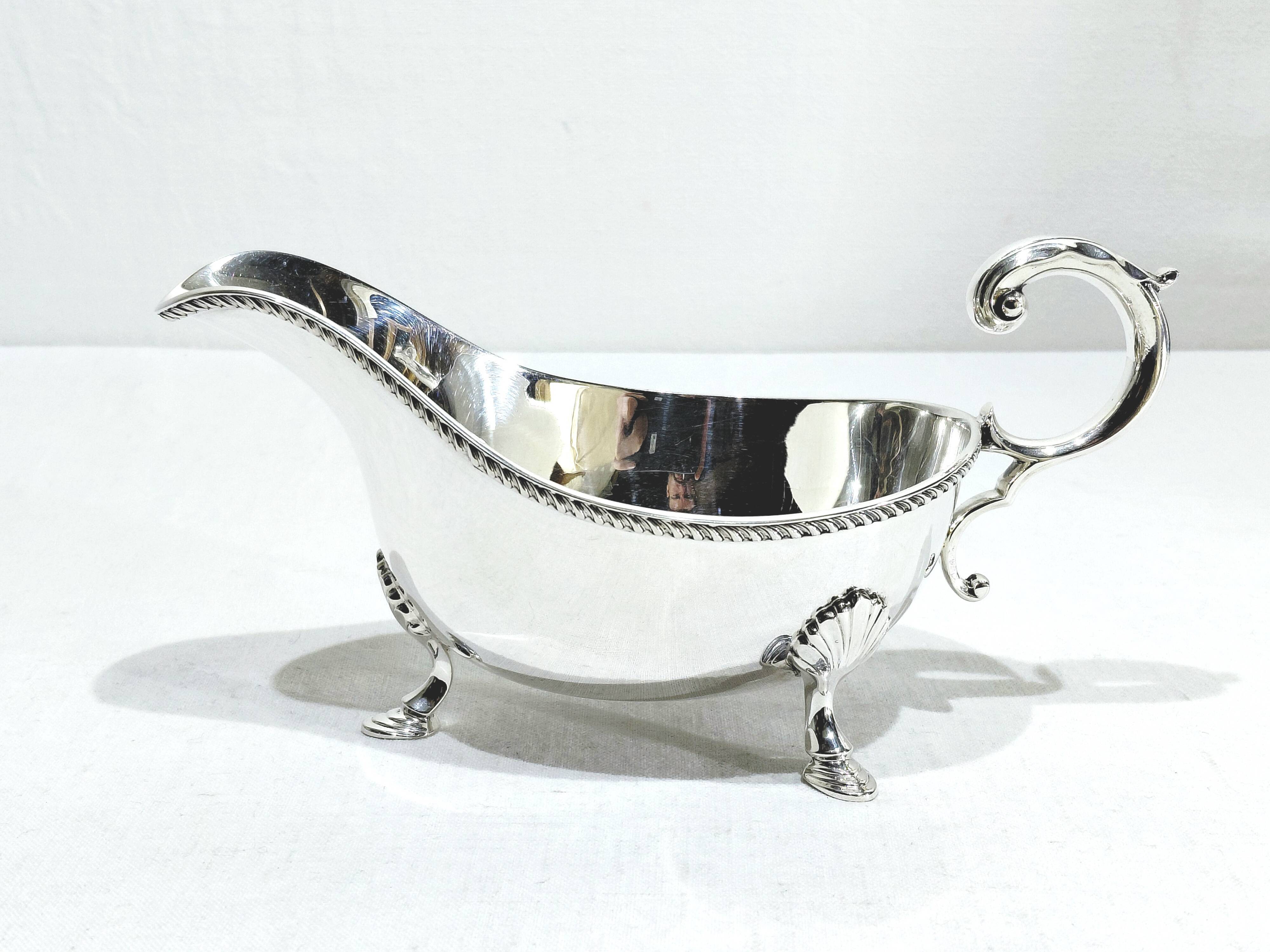 Silver sauceboat, England