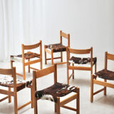 Series of 6 chairs in pine and cowhide 1970