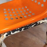 Chair with openwork plastic shell 1970