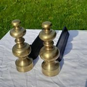 Pair of andirons in black metal and golden balls