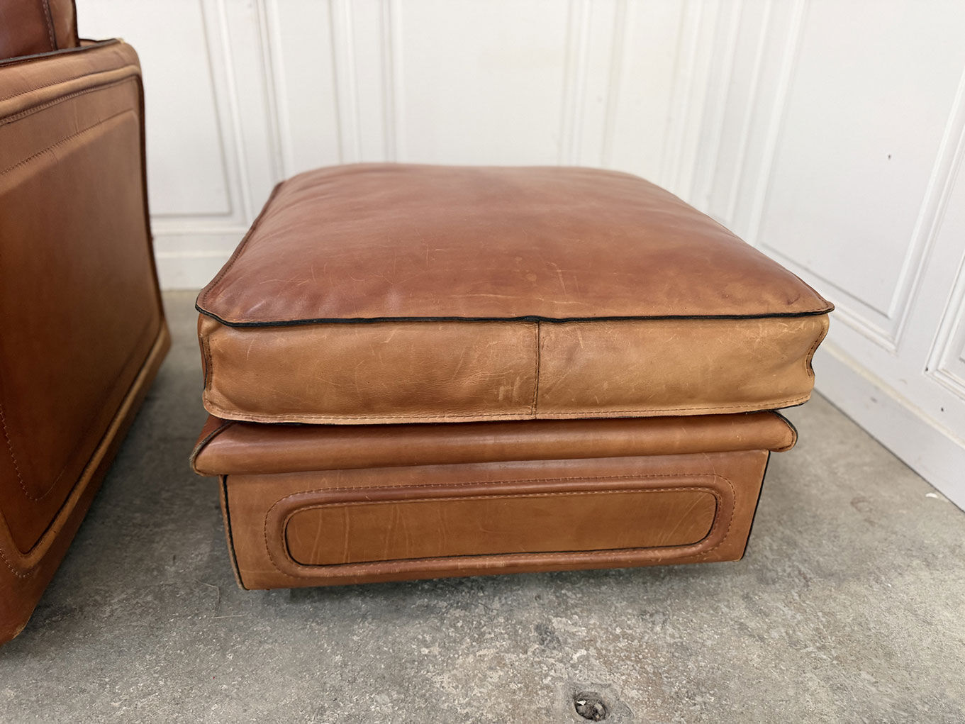 Club armchair and its ottoman 1980s