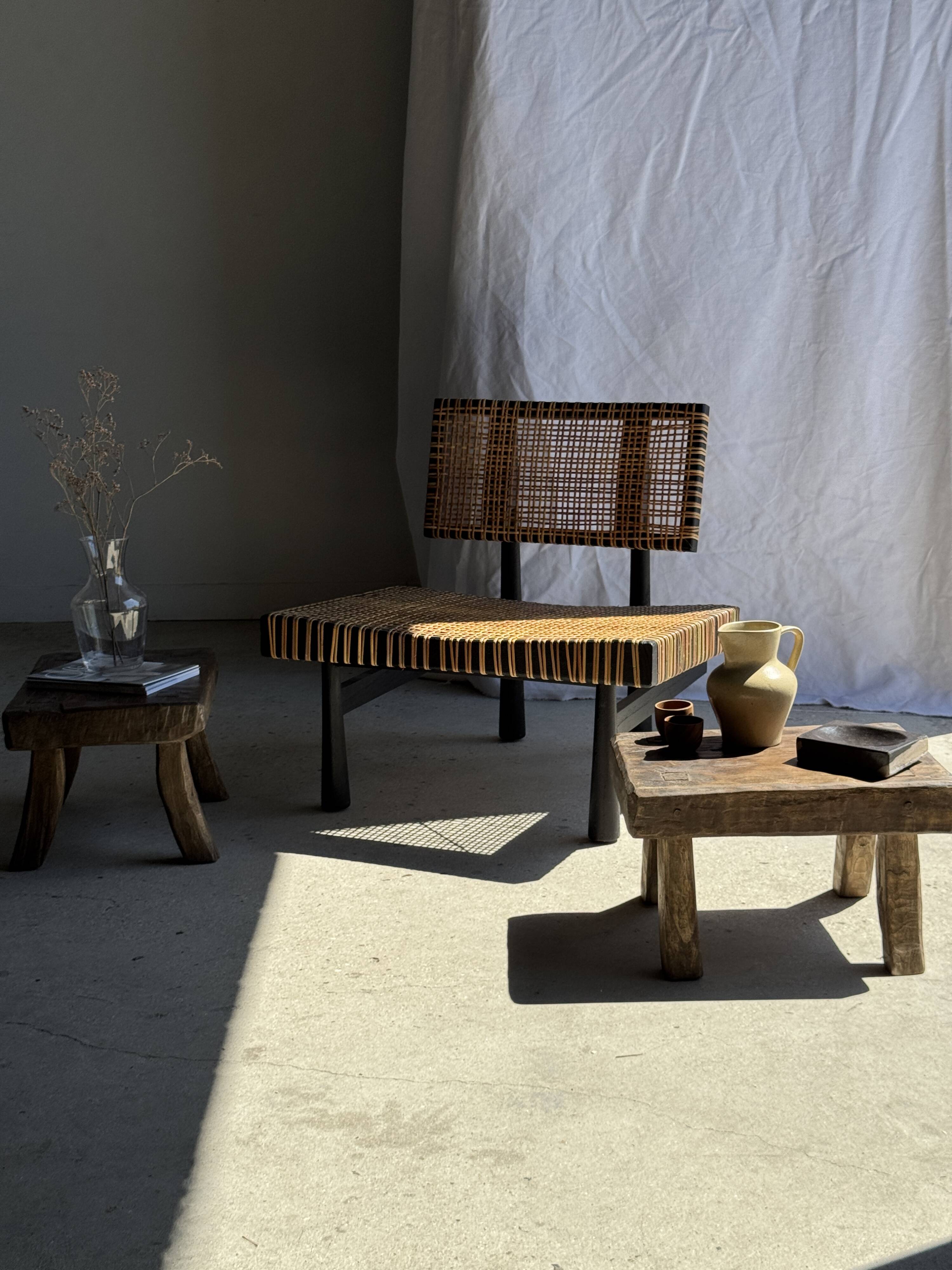 Small stool, rectangular solid teak side table with curved legs.