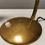 Beautiful table lamp, estimated from the 1950-60s. Made of metal, brass and glass.