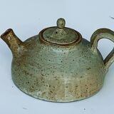 Vintage teapot in reeds