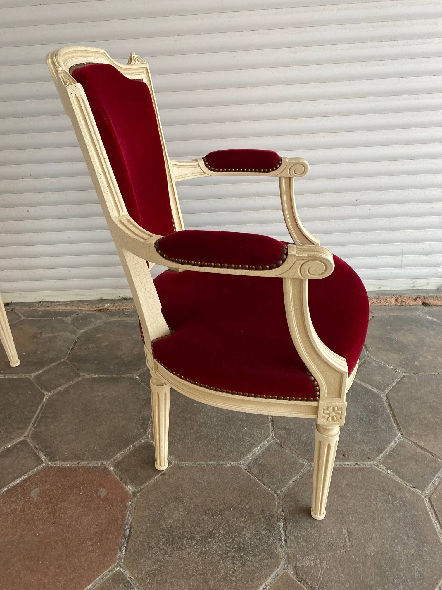 PAIR OF LOUIS XVI STYLE CABRIOLET ARMCHAIRS IN STUDDED RED VELVET FABRIC