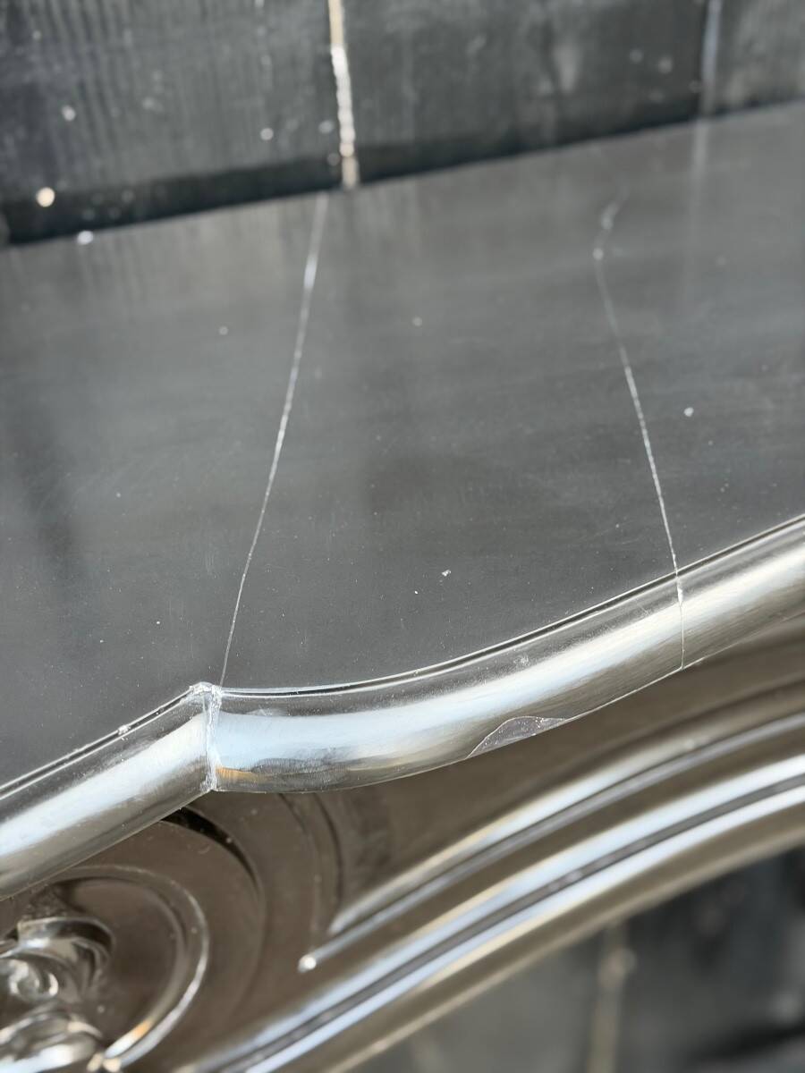 Louis XV style fireplace in black Belgian marble, circa 1880.