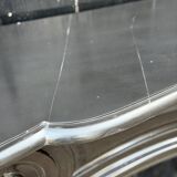 Louis XV style fireplace in black Belgian marble, circa 1880.