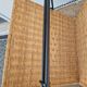 Foldable magazine rack in rattan and metal from the 60s/70s.