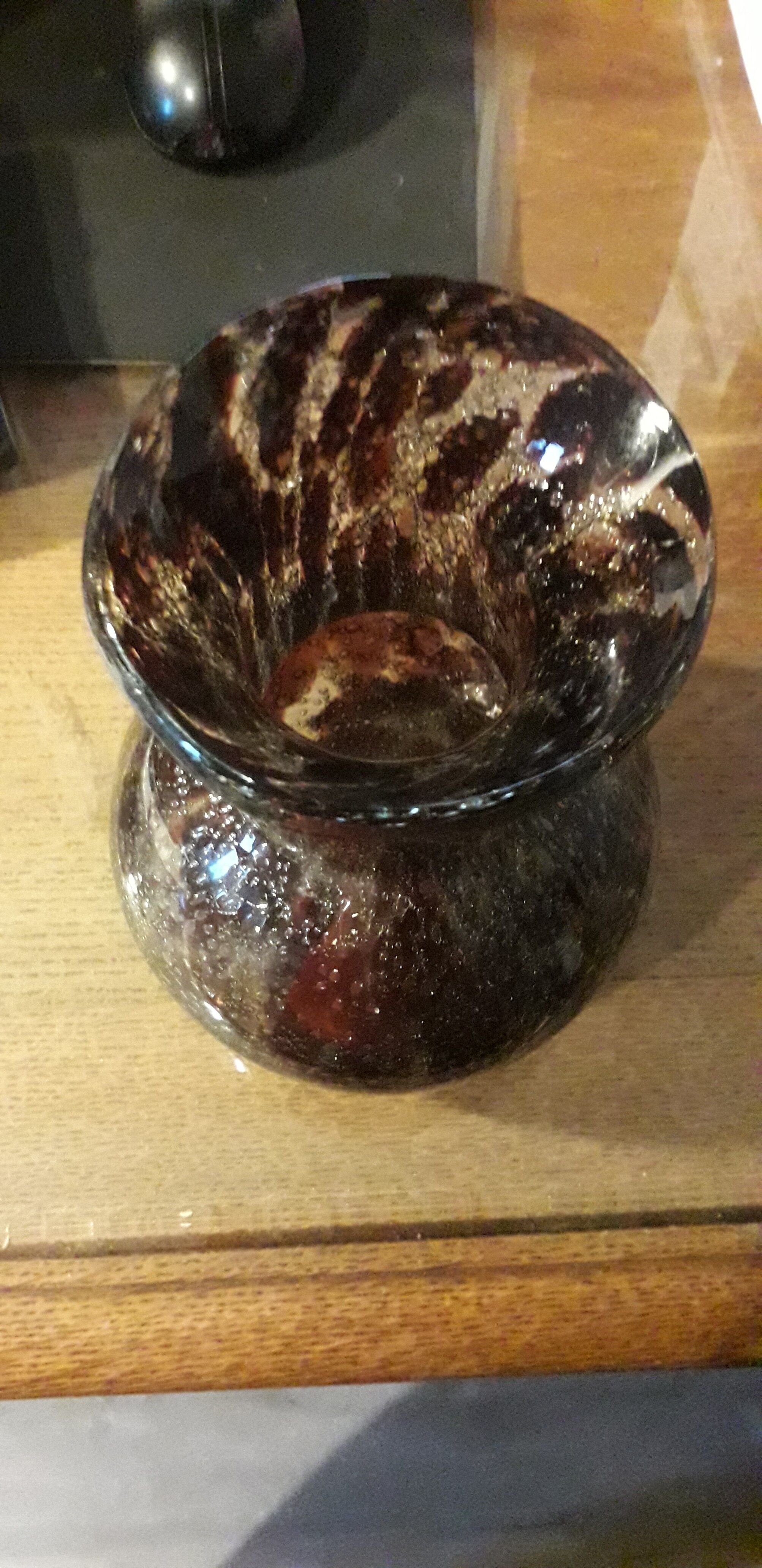 Plum-colored bubbled blown glass vase