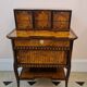 Marquetry stepped desk with La Fontaine's fables, 19th century.