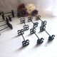 Box of 12 vintage twisted wrought iron knife or cutlery holders