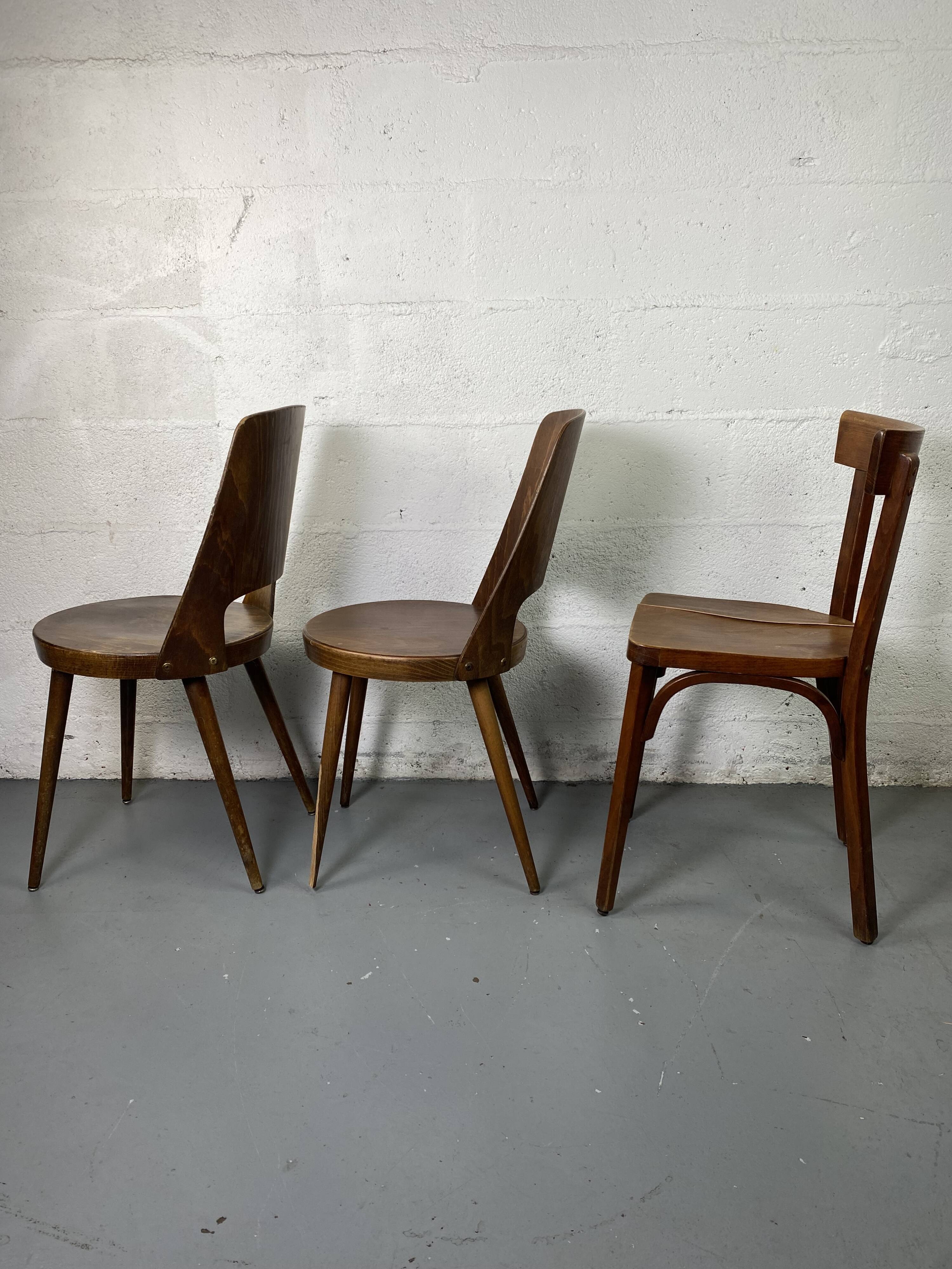 Set of 3 mismatched and damaged bistro chairs