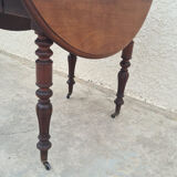 Round table with shutters with extension