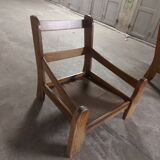 Armchairs in leather and vintage wood 70's