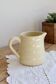 Large vintage Gien jug in ivory earthenware.