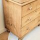 Renovated antique English solid pine chest of drawers.
