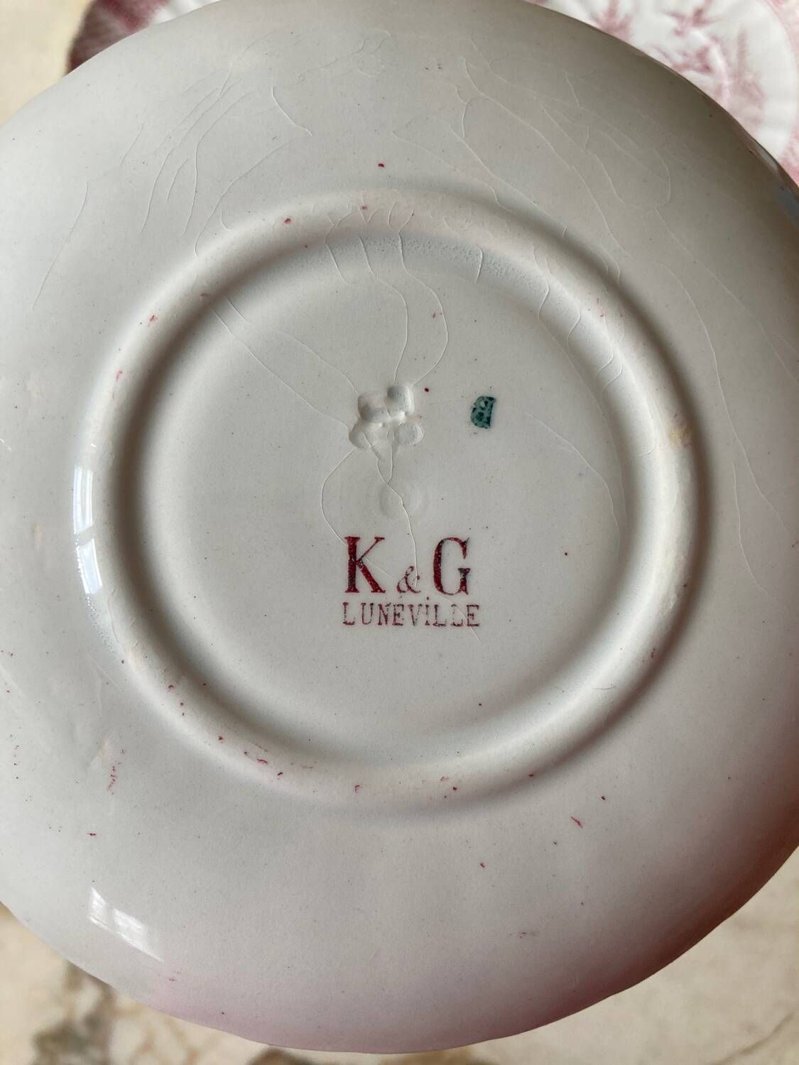 Set of 5 Lunéville “K and G” cups and saucers