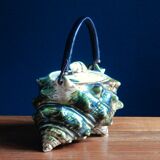 Individual teapot in the shape of a ceramic shell