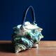 Théière individuelle en forme de coquillage en céramique