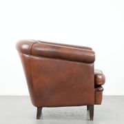 Cognac-coloured cow leather club armchair in English style