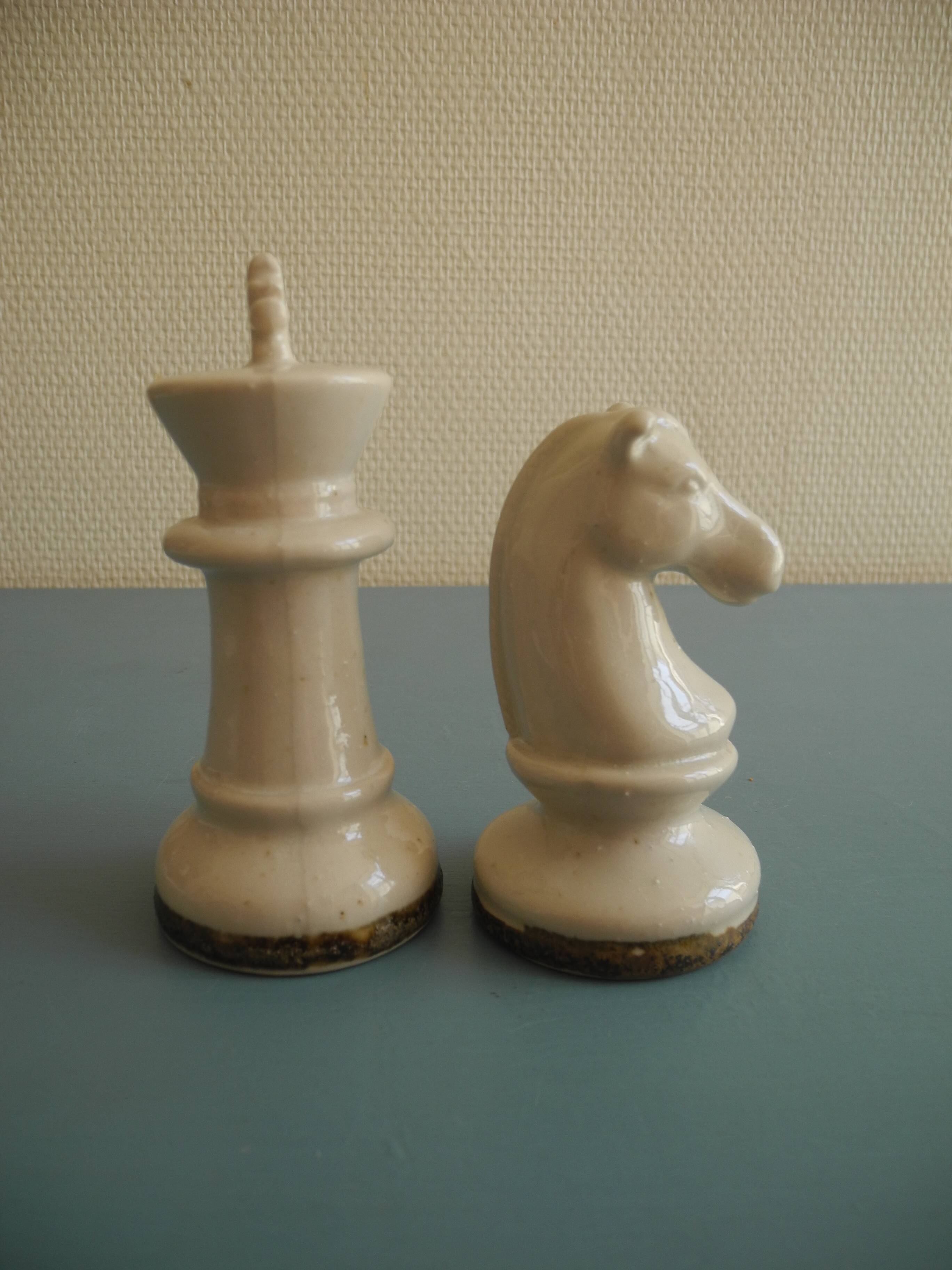 two ceramic chess pieces decorative