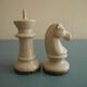 two ceramic chess pieces decorative