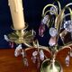 Paire de girandoles en bronze et cristal