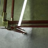 Postmodern Italian design coffee table in smoked glass with red steel structure