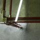 Postmodern Italian design coffee table in smoked glass with red steel structure
