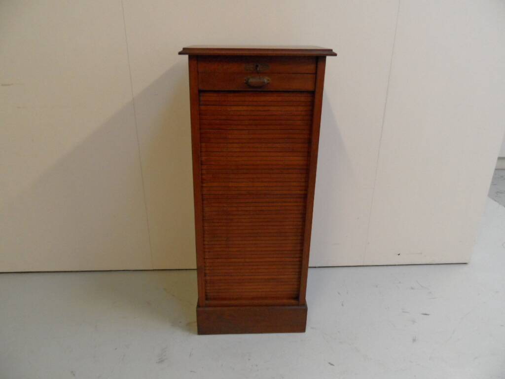 Antique filing cabinet with roller shutter