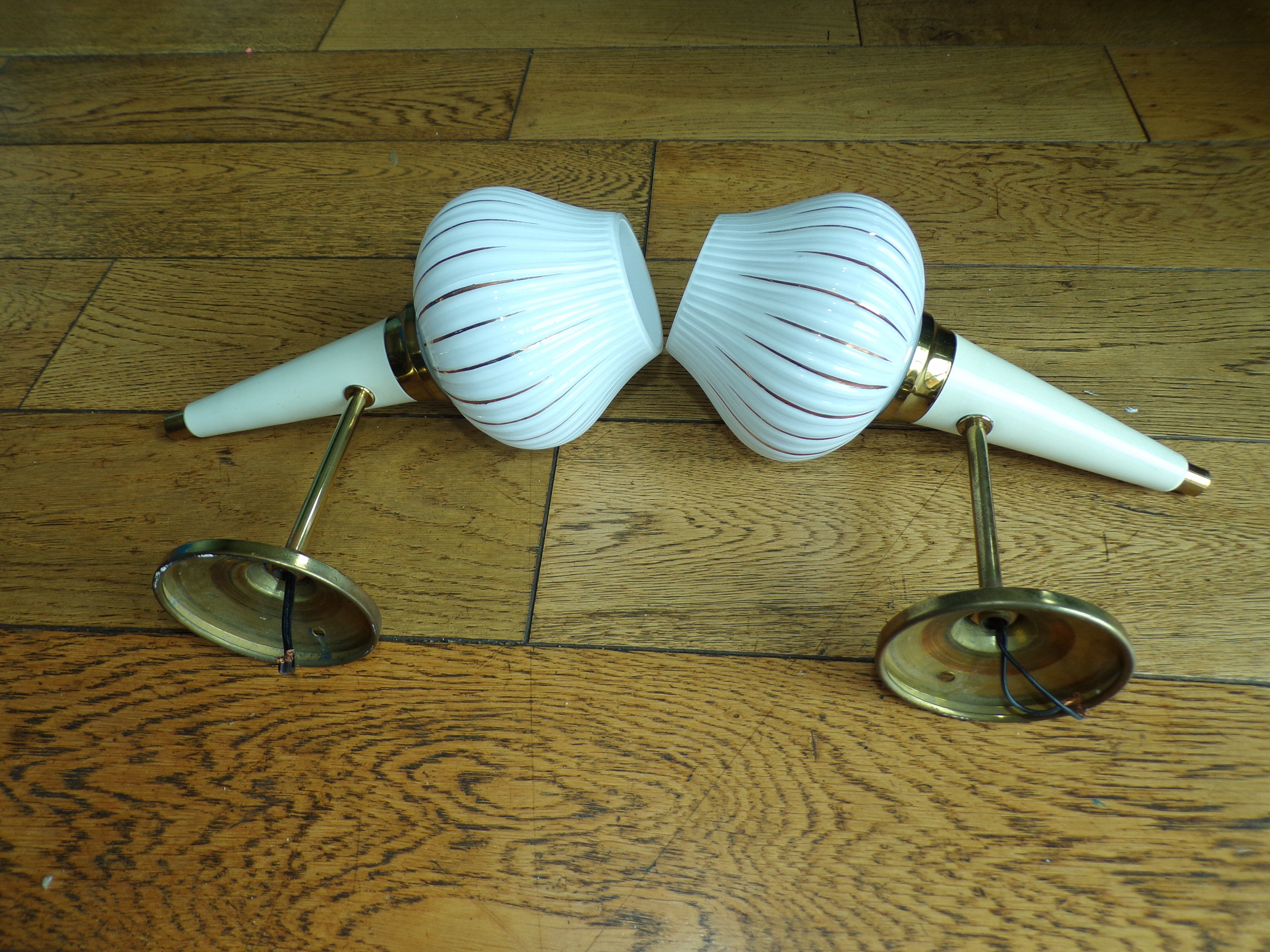 Pair of modernist torch wall light