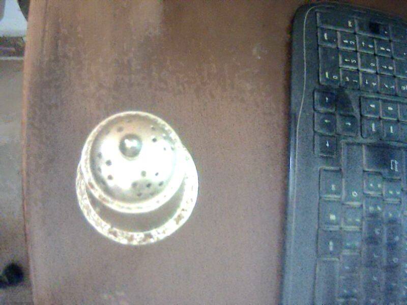 silver metal sprinkler 20th century