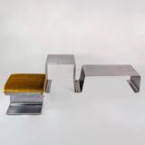 Stainless steel coffee table and stool, by the Roche Bobois design office, 1970