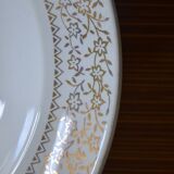 Hollow dish aboard golden flowers
