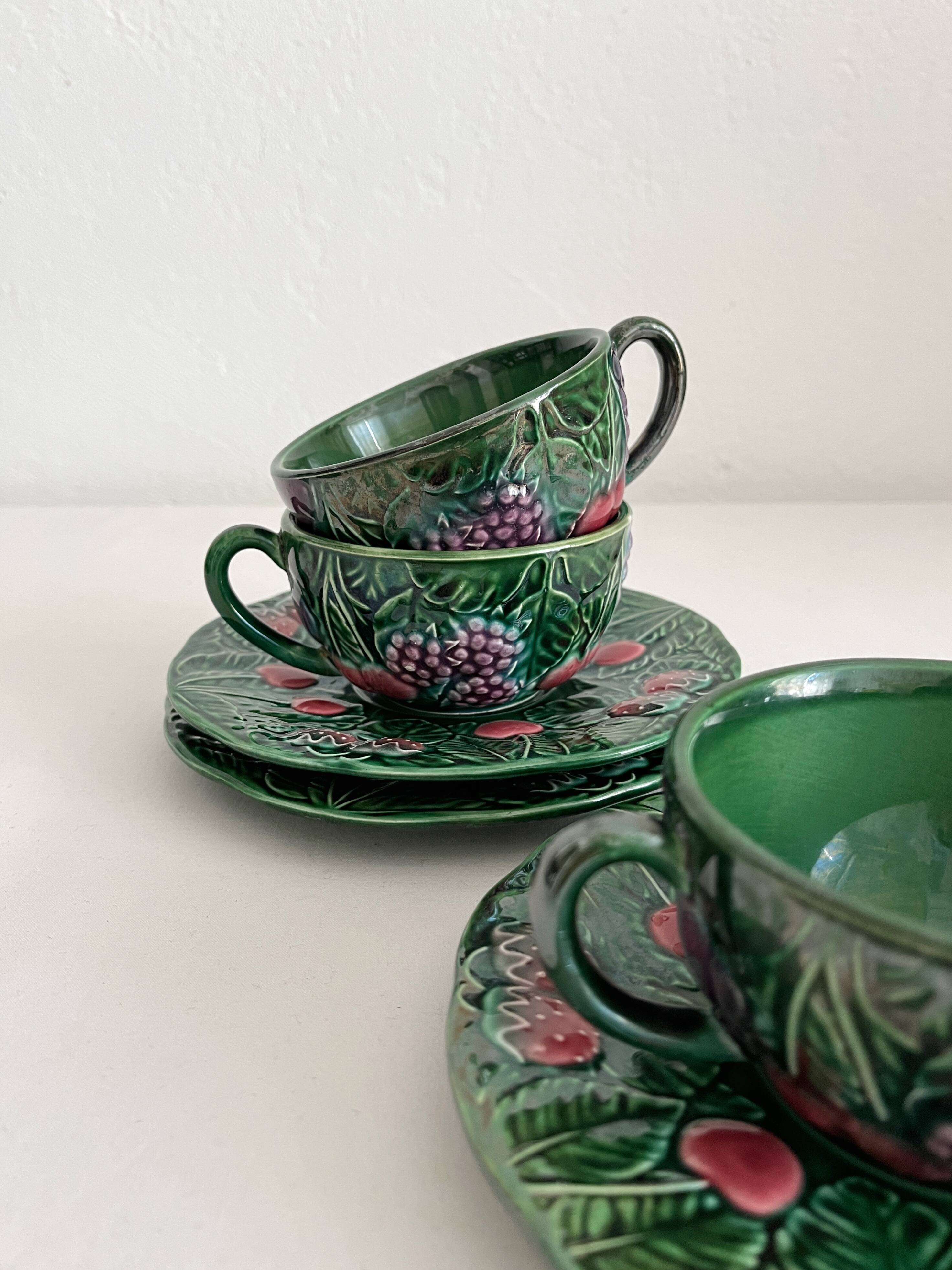 3 earthenware cups and saucers in barbotine fruit decor Salins vintage