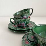 3 earthenware cups and saucers in barbotine fruit decor Salins vintage