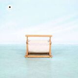 Bohemian magazine rack in vintage 70s pine style.