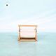 Bohemian magazine rack in vintage 70s pine style.