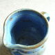 Vernified and flamed sandstone teapot, and its milk pot