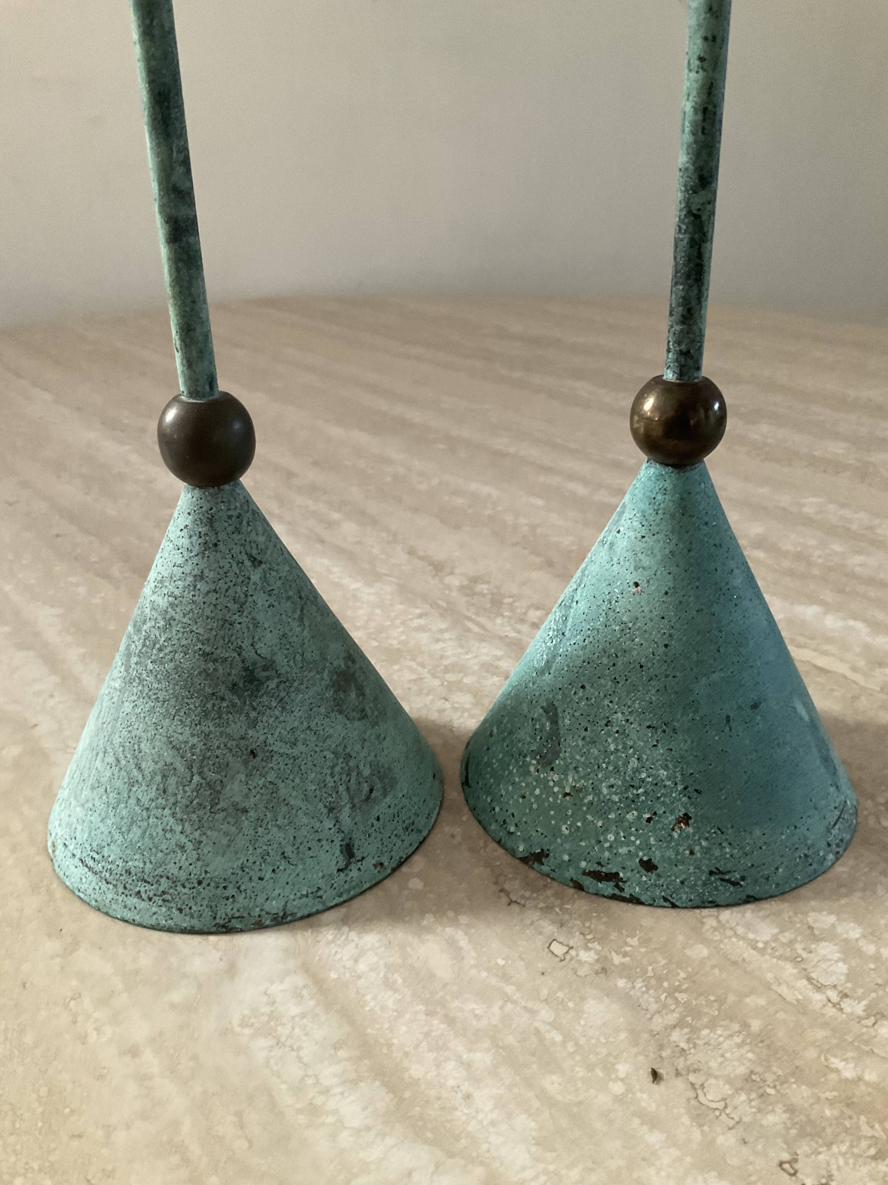 Pair of vintage brass and metal candlesticks