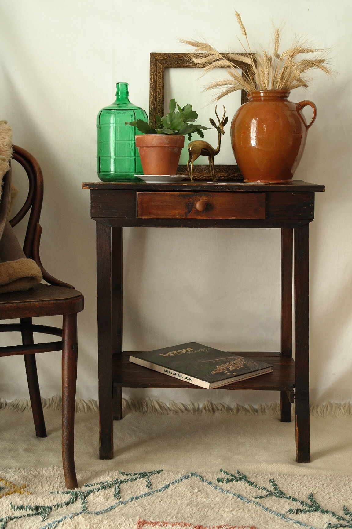 Old country side table in waxed wood