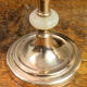 Pair of brass and stone candlesticks