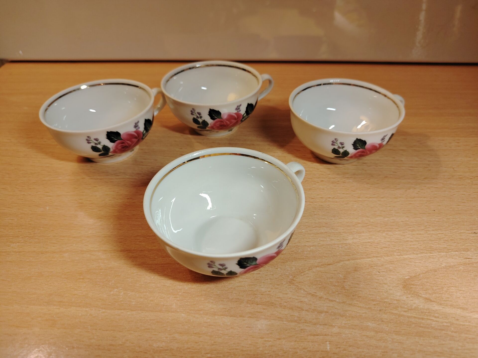 Set of 4 antique porcelain cups with rose pattern CNP France