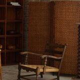A pair of modern and sculptural vintage Danish armchairs in oak and papercord, 1940s.