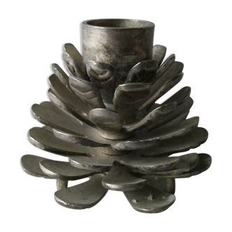 Silver-coloured metal pine cone candlestick