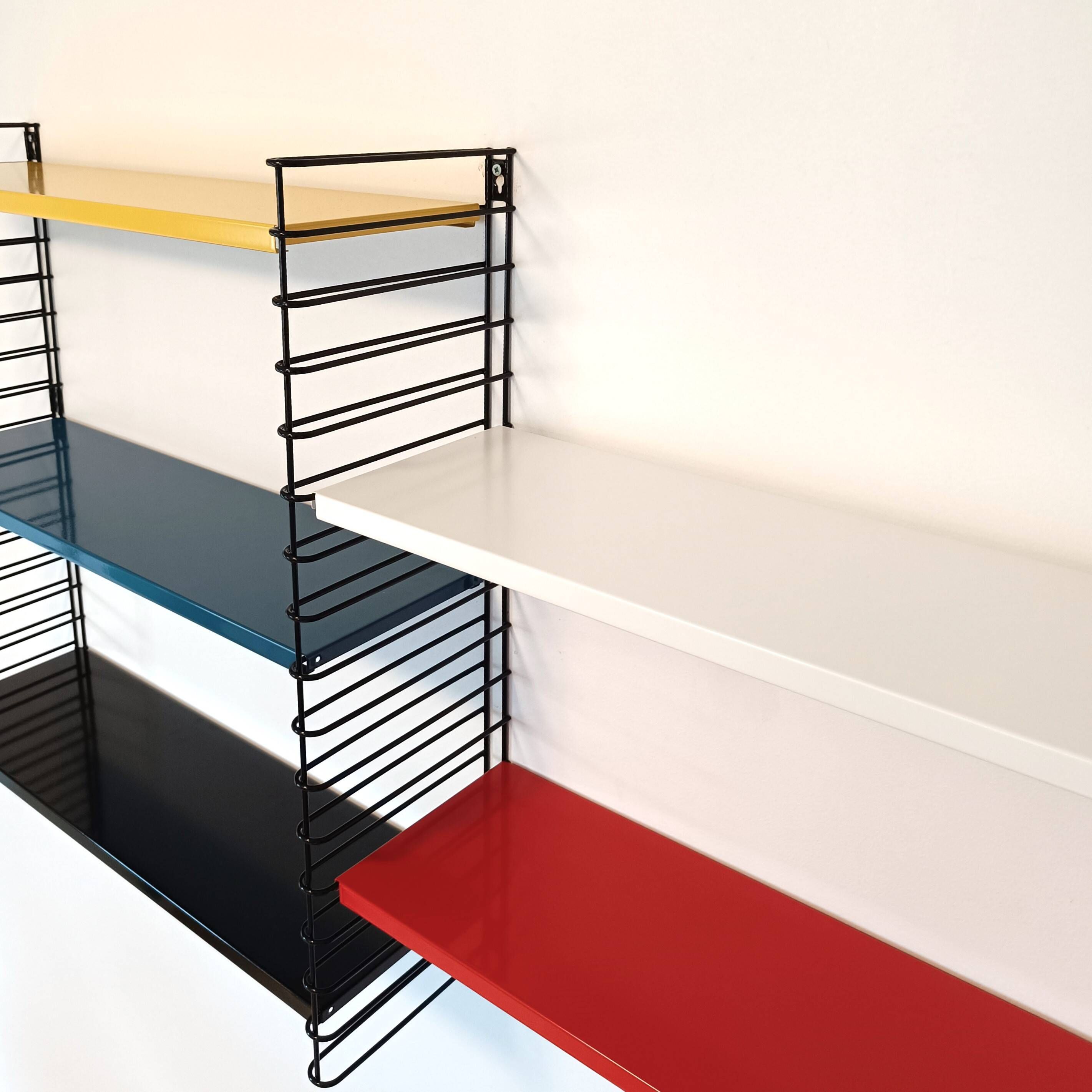 Tomado wall unit with metal shelves by A. Dekker