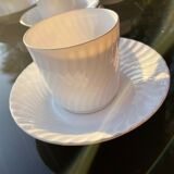 White cups with golden handle