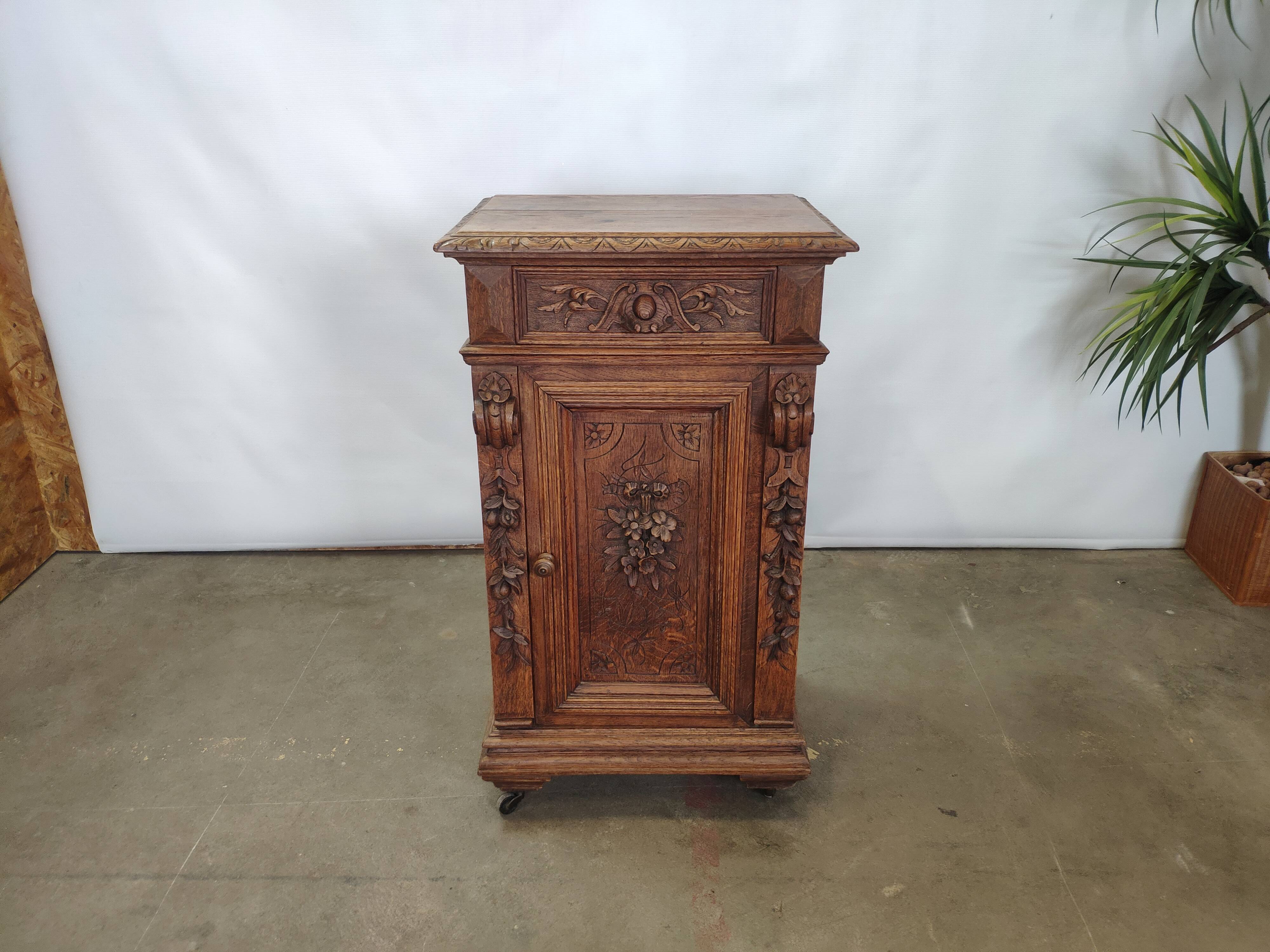 Bedside table carved in oak