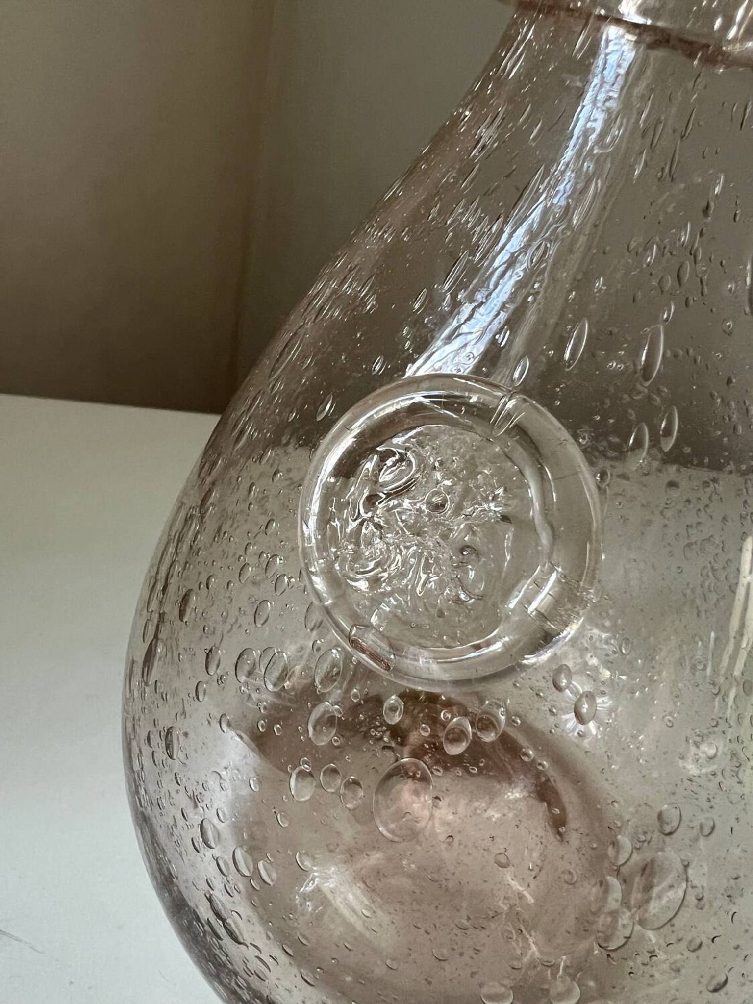 Biot water or wine carafe, pink bubble glass