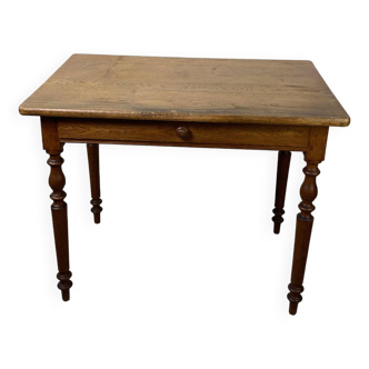 Wooden table with drawer